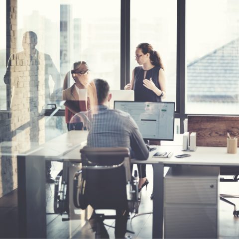Group of office workers in a meeting