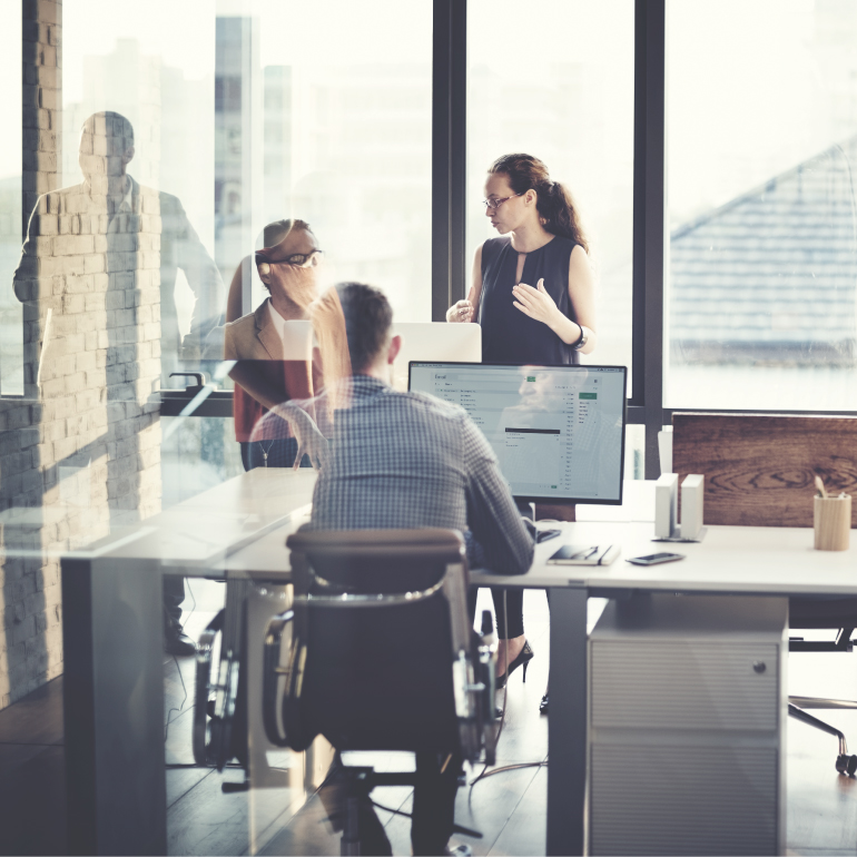 Group of office workers in a meeting